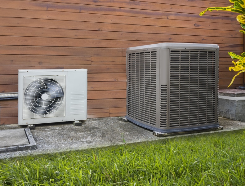 Heat Pump and AC outside of home